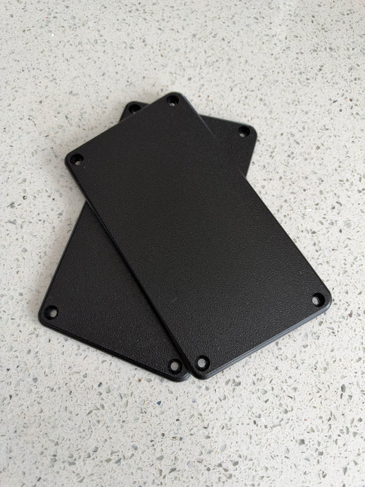 Hobie Pro Angler 14 Rod Tube Delete Plates pair - two black rectangular plates with rounded corners and four mounting holes each